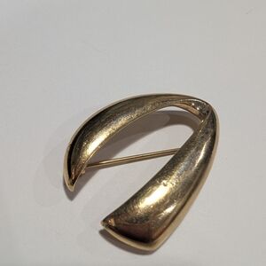 Monet Shiny Gold-Tone Curved Sculptural Brooch